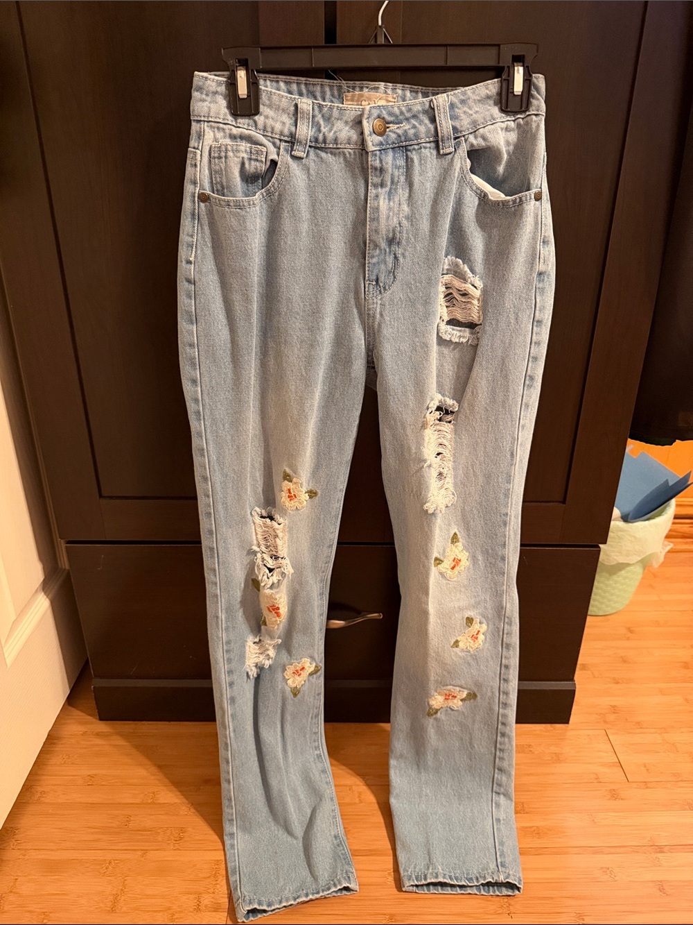 CHELSEA & VIOLET Light Wash Distressed Women's Jeans with Floral Patch Details
